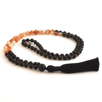 Handmade Creativity Mala Necklace – Carnelian & Lava for Passion & Energy curled on table